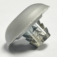 Barbed encapsulated T-nut for use with FRP trailers